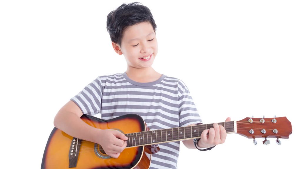 Happy Kid Playing Guitar